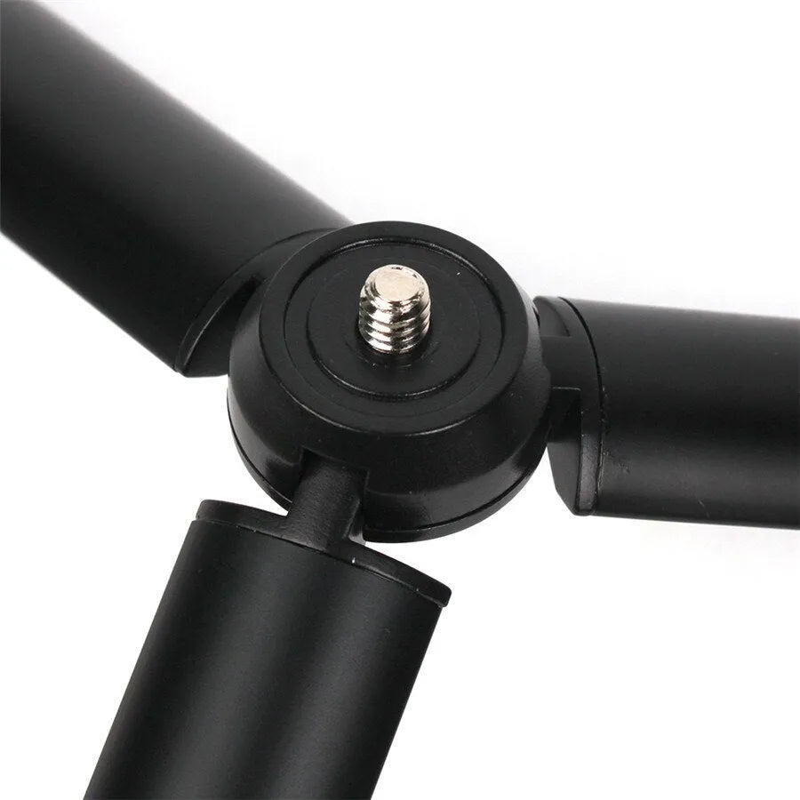 Black aluminium alloy tripod and handheld stabiliser for Apple iPhone mobile phones