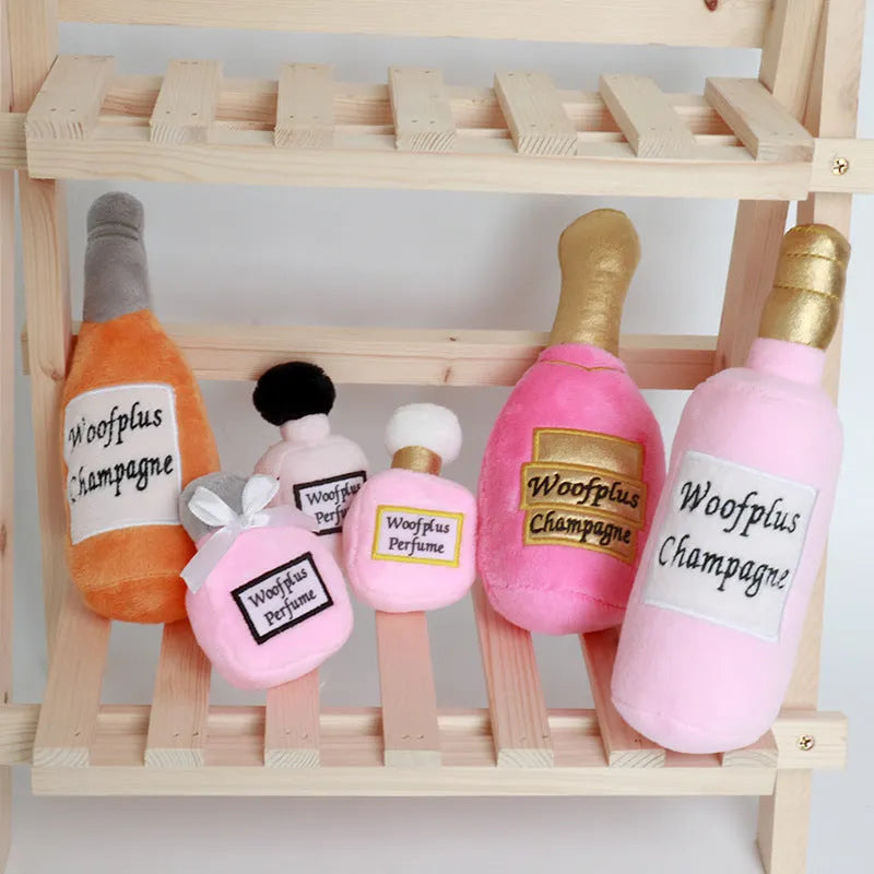 Soft plush pet toy in the shape of a wine bottle, shown in various colours.