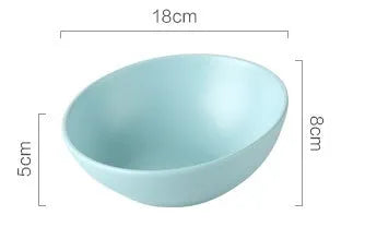 Ceramic pet bowl in blue with non-slip shelf, size M 600ml, on a wooden floor