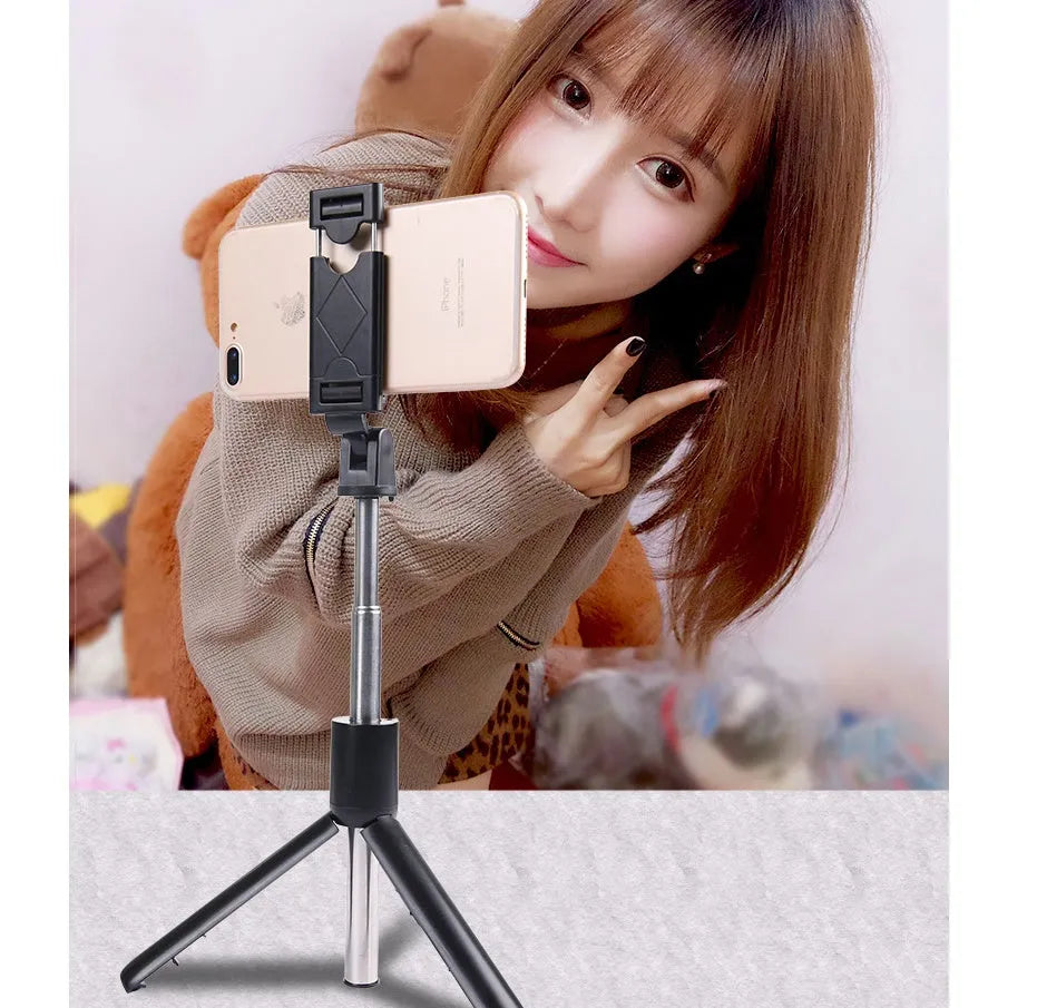 Bluetooth selfie stick tripod folded at 195mm in A White colour, compatible with iPhone Android and Huawei smartphones