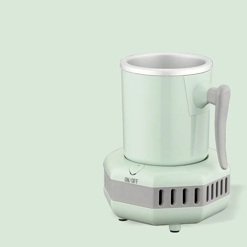 White mini cooling cup with semiconductor refrigeration base on desk