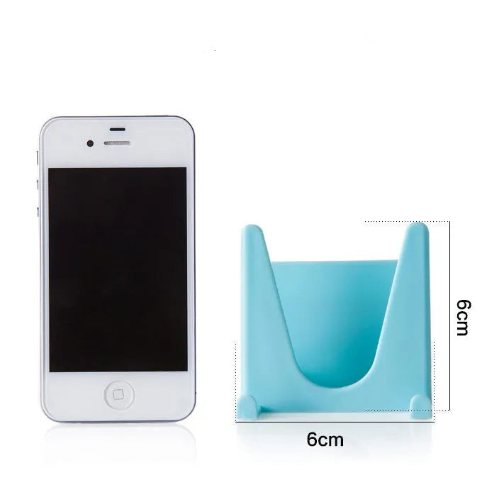 Wall-mounted PP plastic kitchen lid holder in blue, green or white, stuck inside a cabinet for lids and utensils.