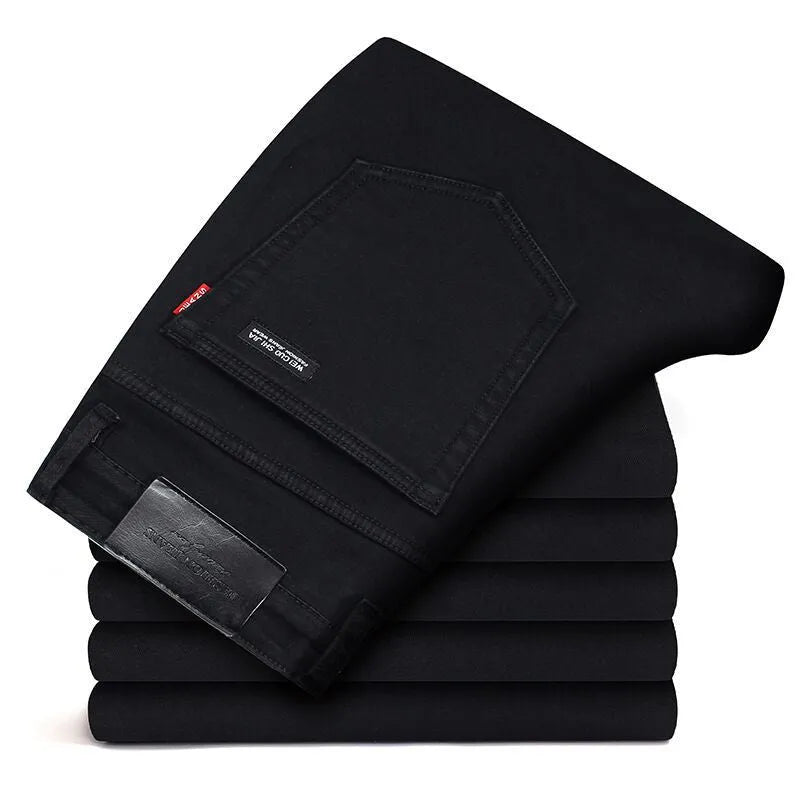Men's slim straight black jeans made of cotton denim, flat lay