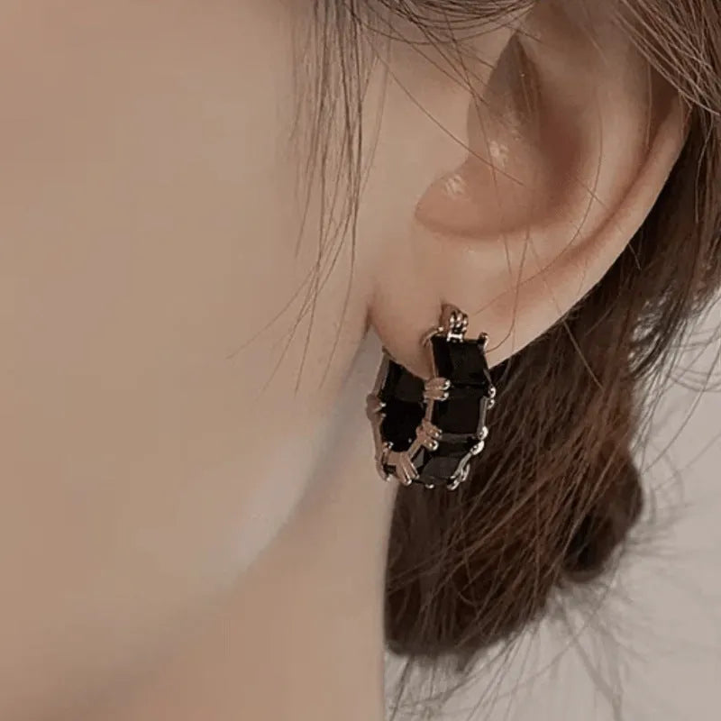 Women's black zirconium geometric drop earrings with gold electroplated U-shaped design