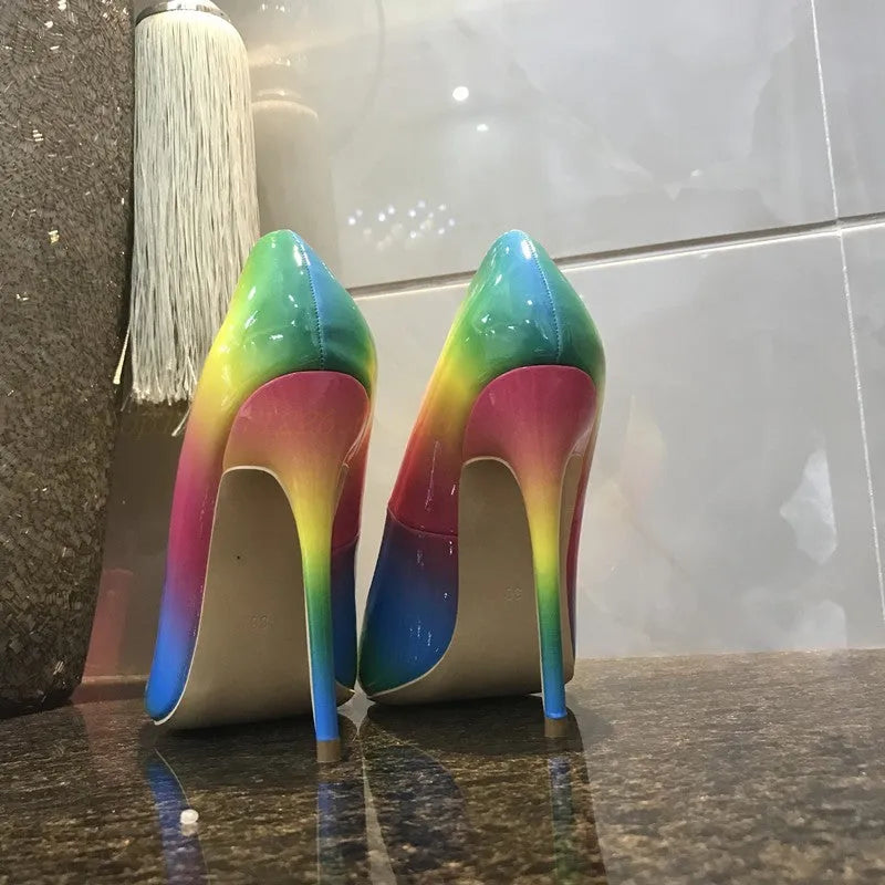 Rainbow coloured patent leather high heels with pointed toe and thin ultra-high heel