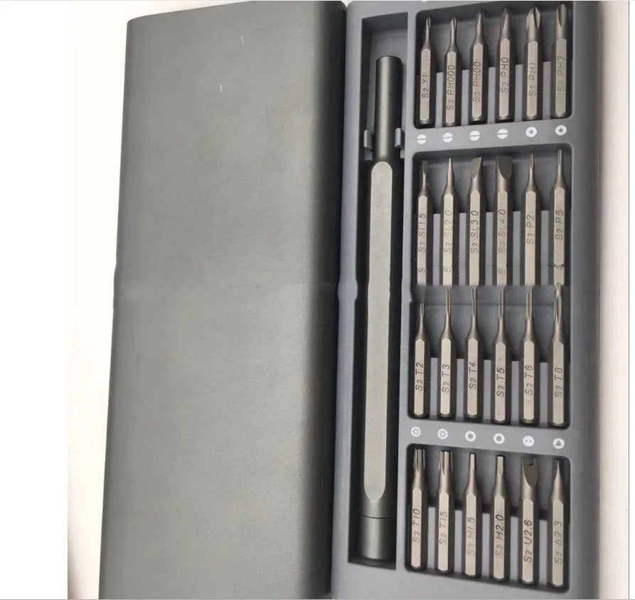 24 in 1 grey aluminium alloy screwdriver set with S2 steel bits on a workbench