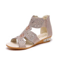 Women's flat black sandals with rhinestone details and a back zipper closure