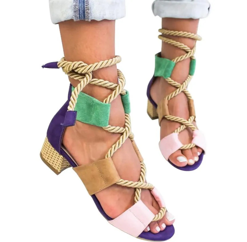 Women's beige suede sandals with fish mouth toe, front strap, ankle strap, and a thick middle heel.