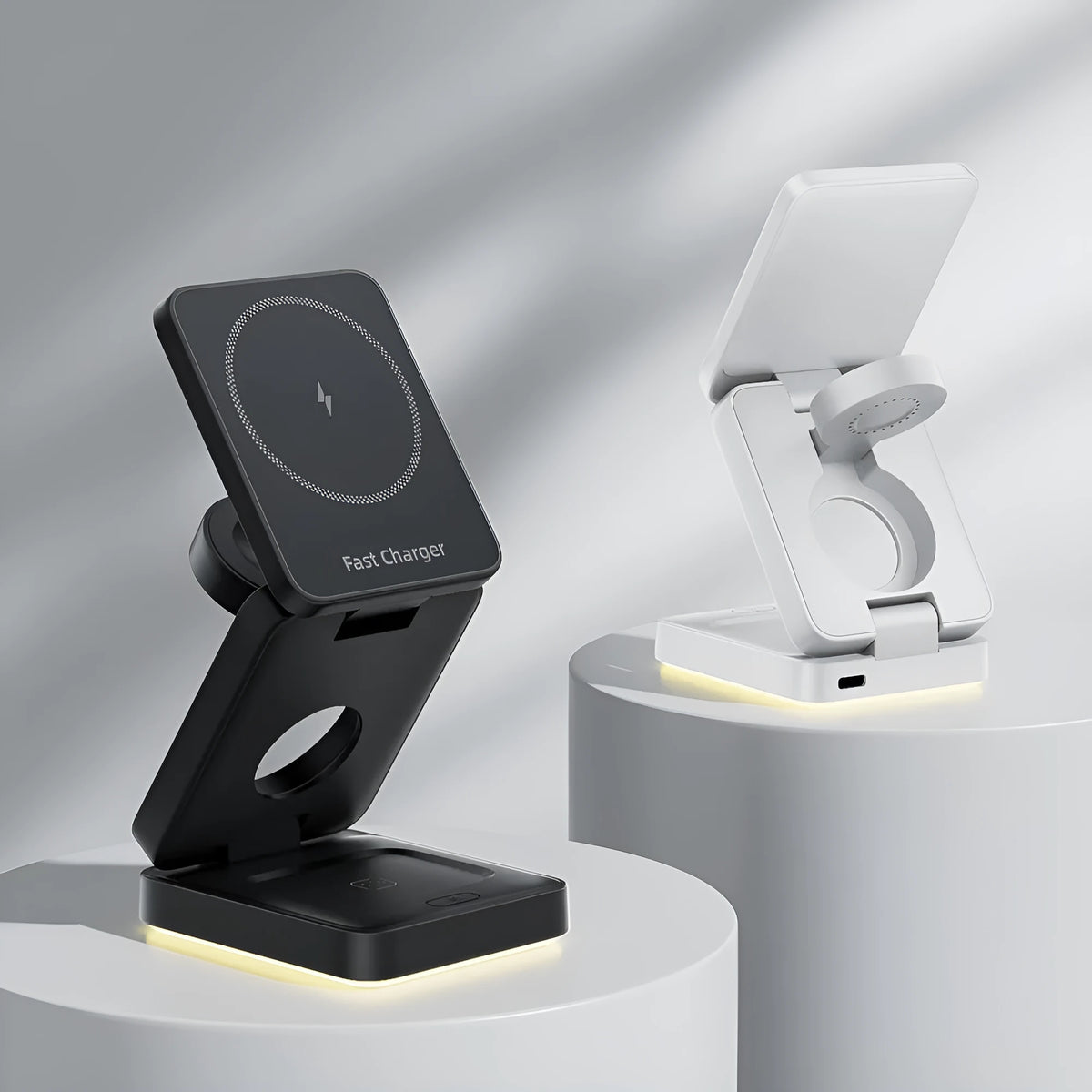 Three-in-one folding magnetic wireless charger in black or white with USB cable and manual