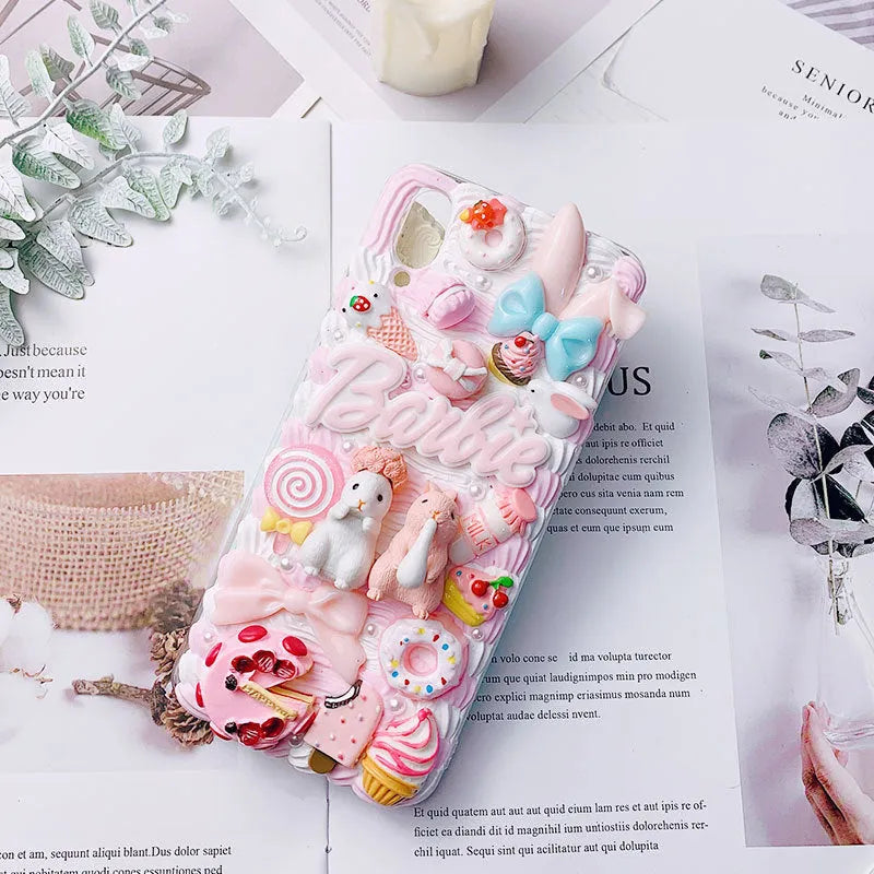 Pink and green cartoon rabbit design 3D silicone iPhone case showing textured surface and precise model fit