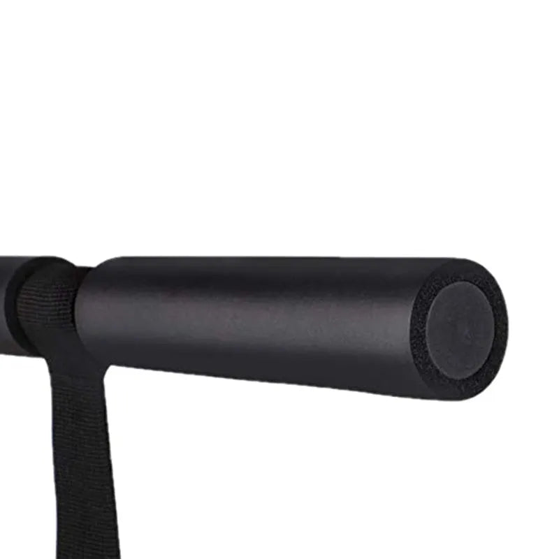 Black abdominal fitness device made from steel foam and PVC tube, 3.1 by 32 by 21.5 centimetres on a flat surface