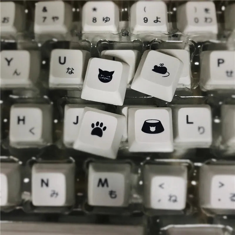 White Japanese keycap set with 100 PBT keycaps featuring sublimated character legends for mechanical keyboards
