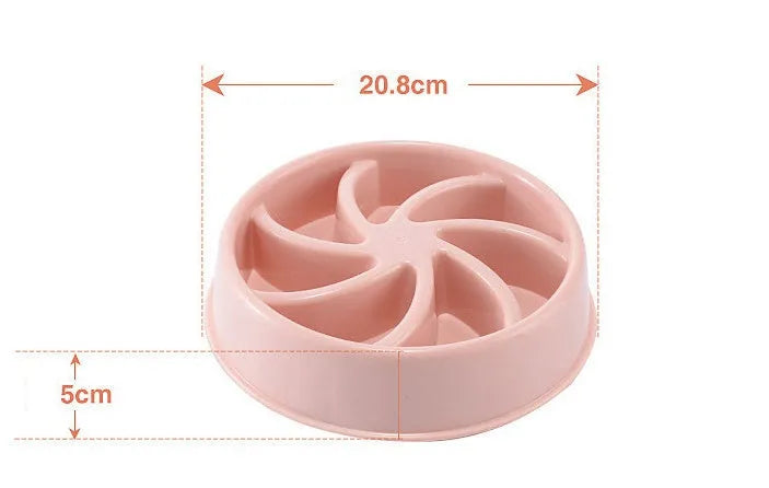 Plastic slow food bowl for dogs and cats with flower-shaped internal obstacles, pink colour, choke prevention design.