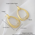 Yellow gold geometric drop earrings for women with simple zircon details on a copper base.