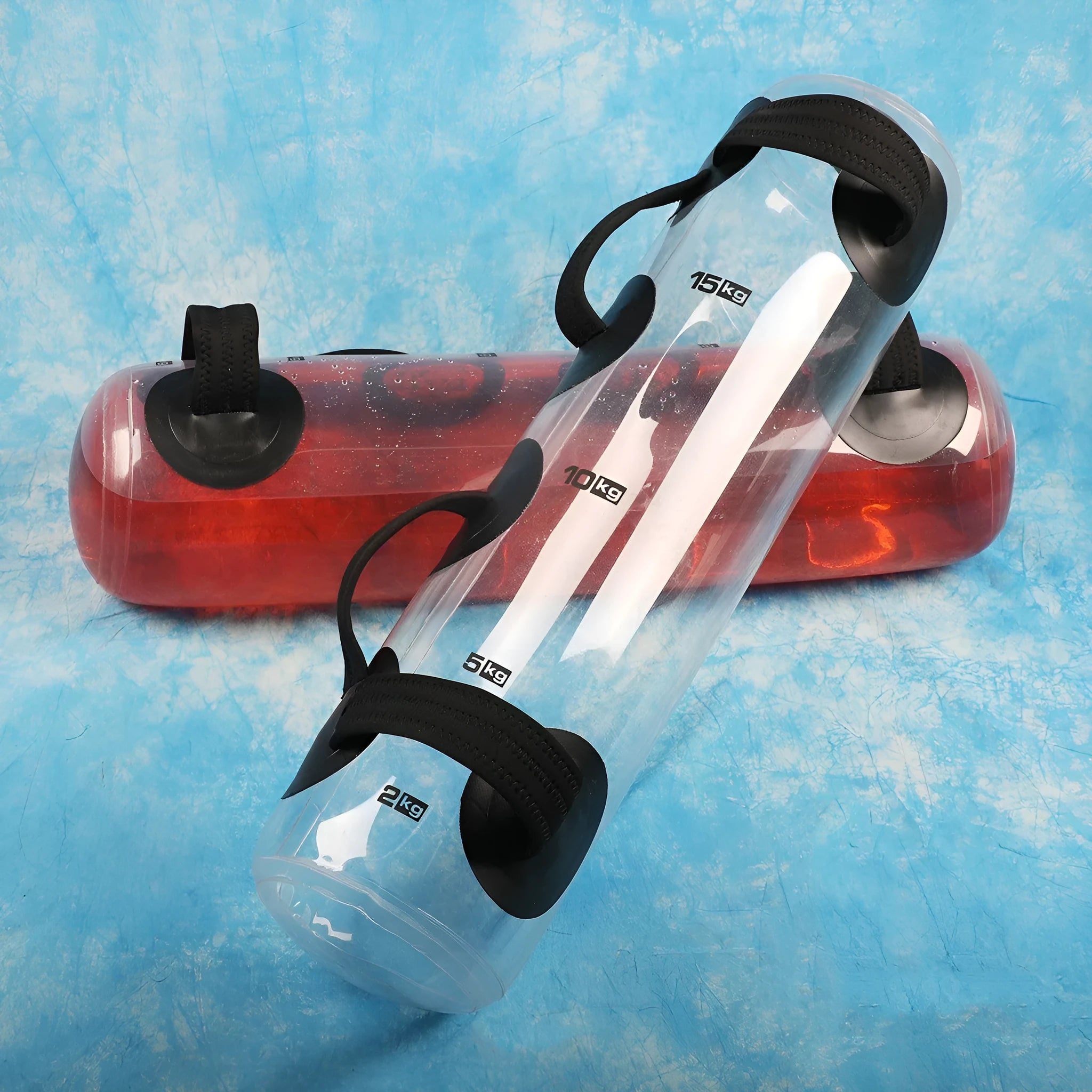Transparent PVC inflatable dumbbell bag filled with water for adjustable weight strength training.