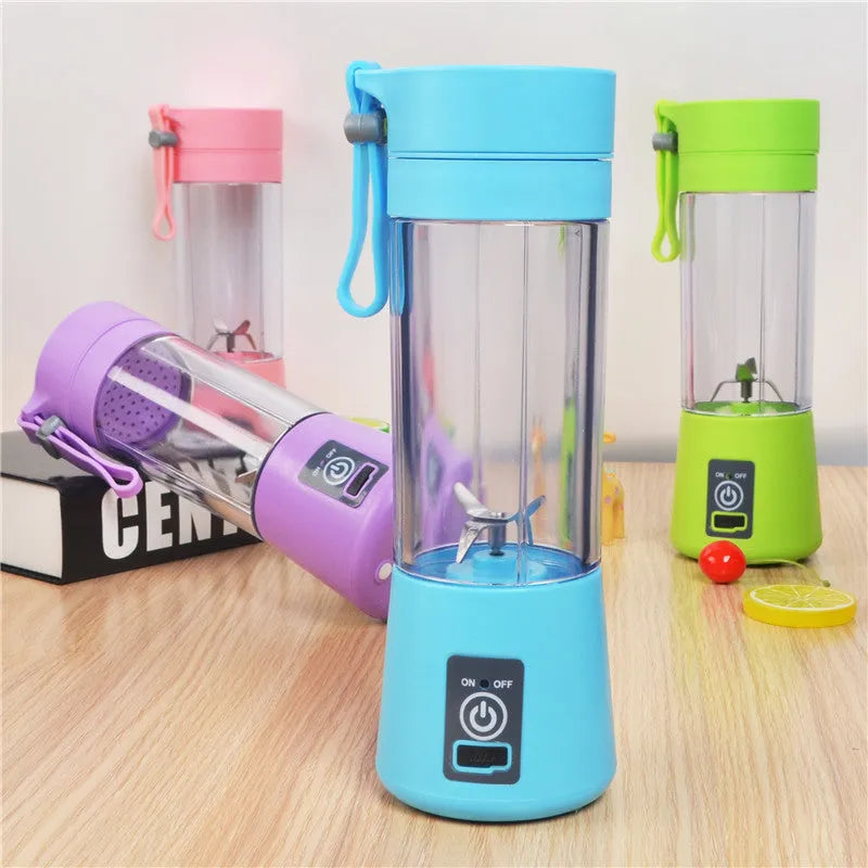 Mini USB electric citrus juicer with carry rope in pink, purple, blue, or green colours