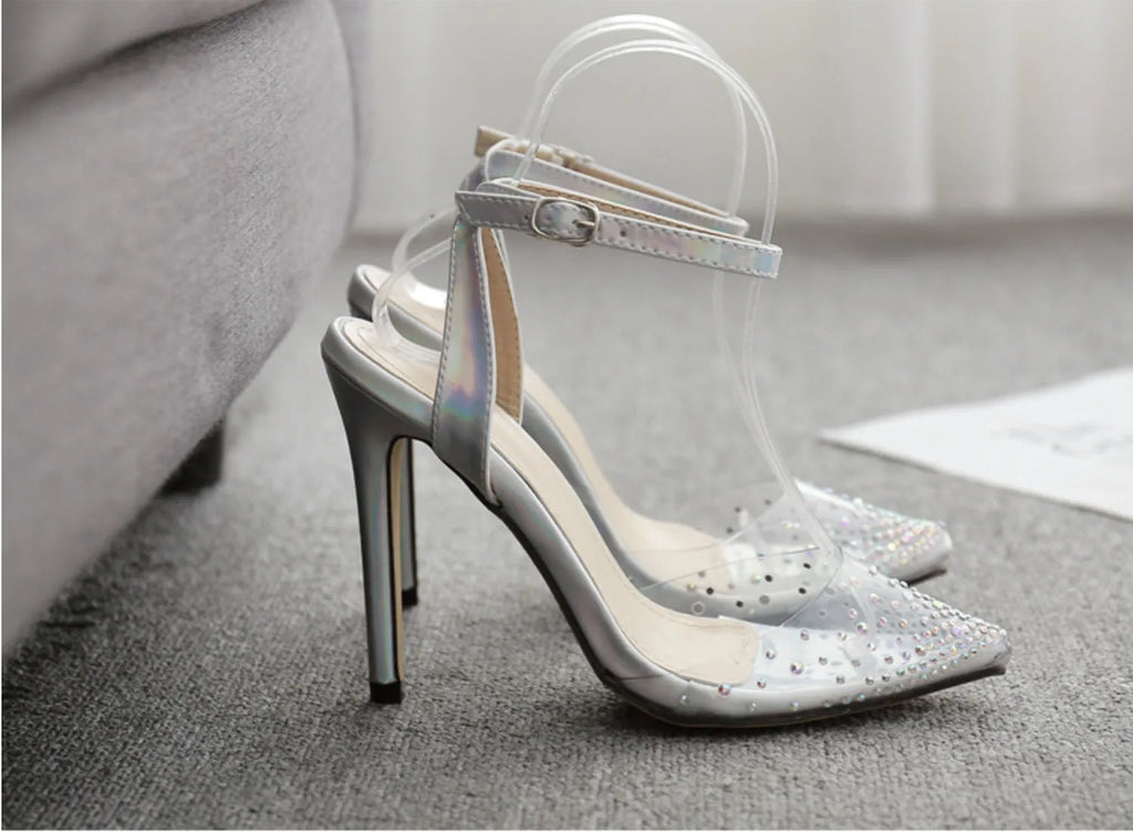 Women's pointed toe sandals with diamond pattern and stiletto heel on a white background.