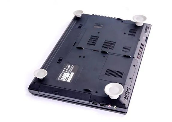 Grey durable plastic laptop cooling stand with two large and two small non-slip pads.