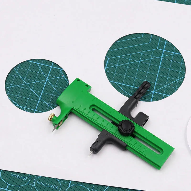 Small circular rail knife with plastic body and metal accessories for paper, cloth, and model cutting in blue