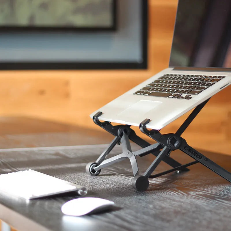 Black folding portable laptop stand with reinforced nylon construction showing 35.4cm width dimensions