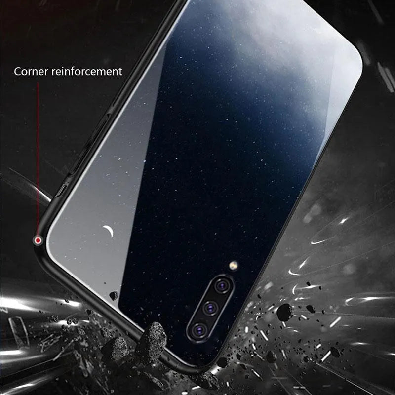 Simple black silicone phone case shown next to a navy blue version, for Samsung and iPhone models.