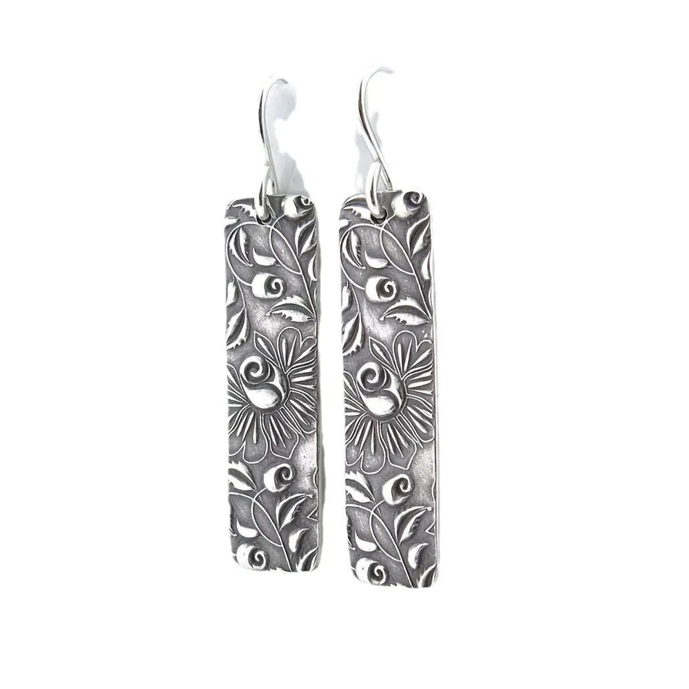 Silver geometric long earrings with carved vine patterns on zinc alloy