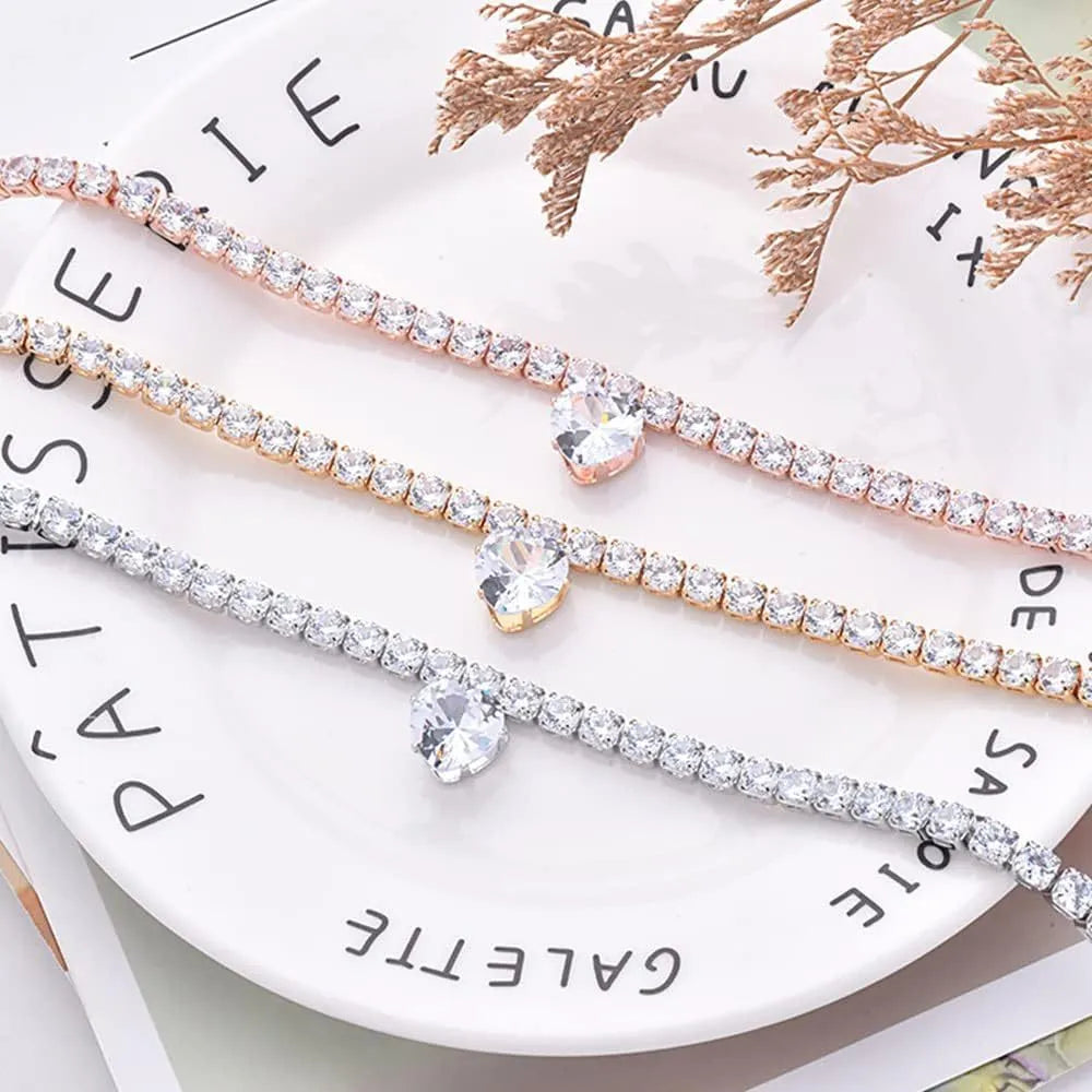 Gold rhinestone heart-shaped collar for dogs and cats on a metal chain.