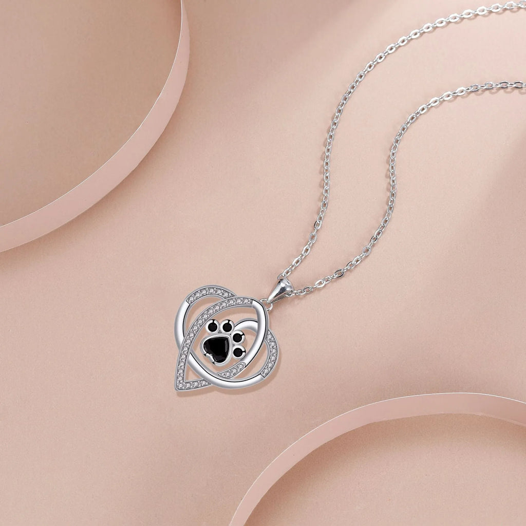 Women's necklace with dog paw and cat footprint copper pendant on cross chain