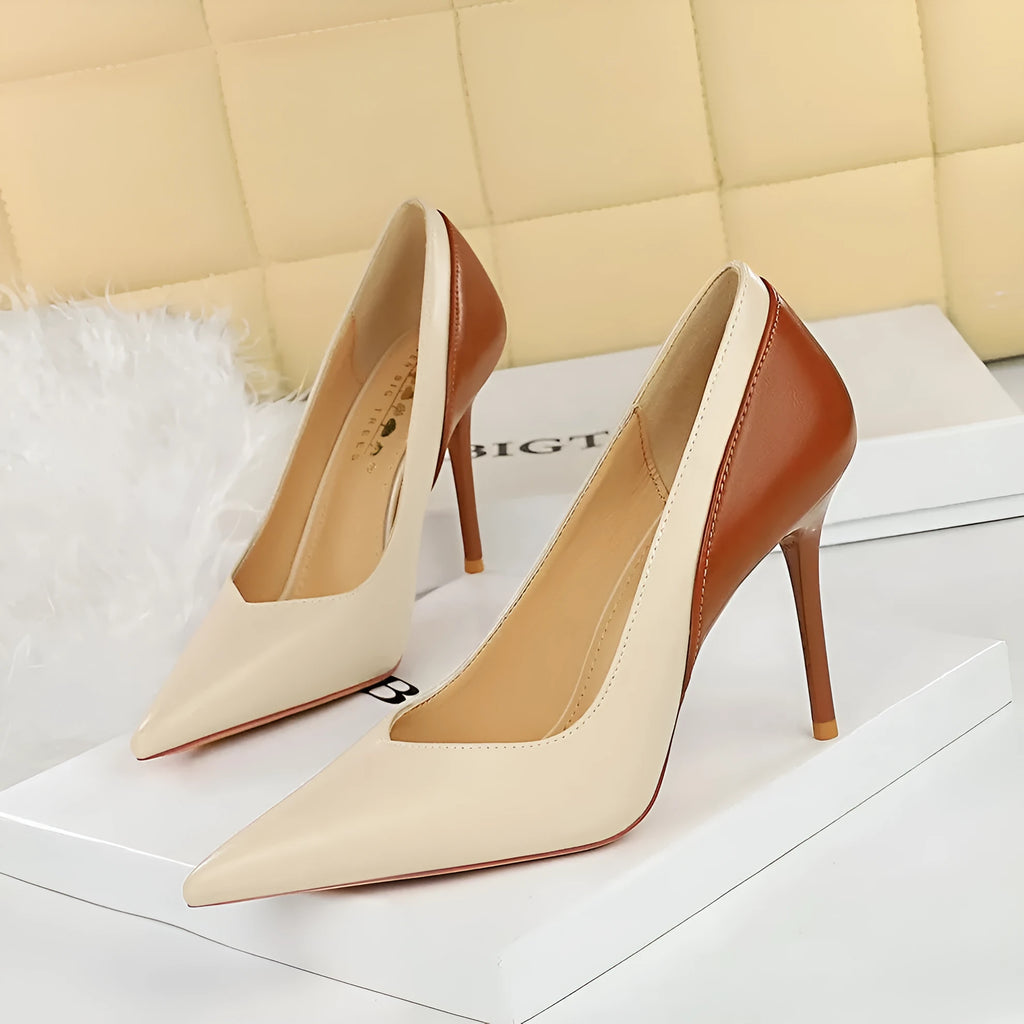 Retro black and creamy-white women's stiletto pumps with pointed toe for banquets