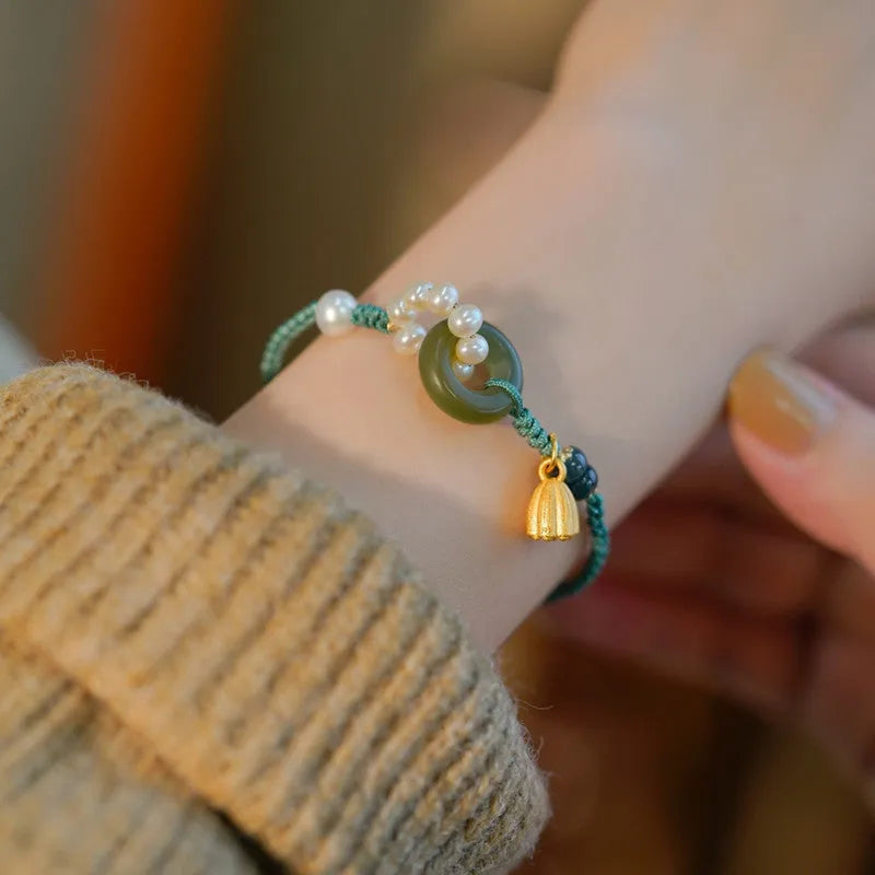 Hand-woven flexible wire watch band with Pearl Peace Buckle and round jade pearl decoration