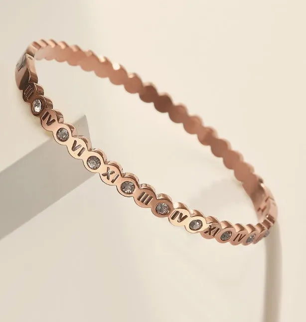 Korean style titanium steel bracelet with number elements in gold, rose gold, and steel colour options