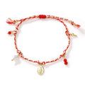 A colourful hand-woven braided rope bracelet in an ethnic strap style for women.
