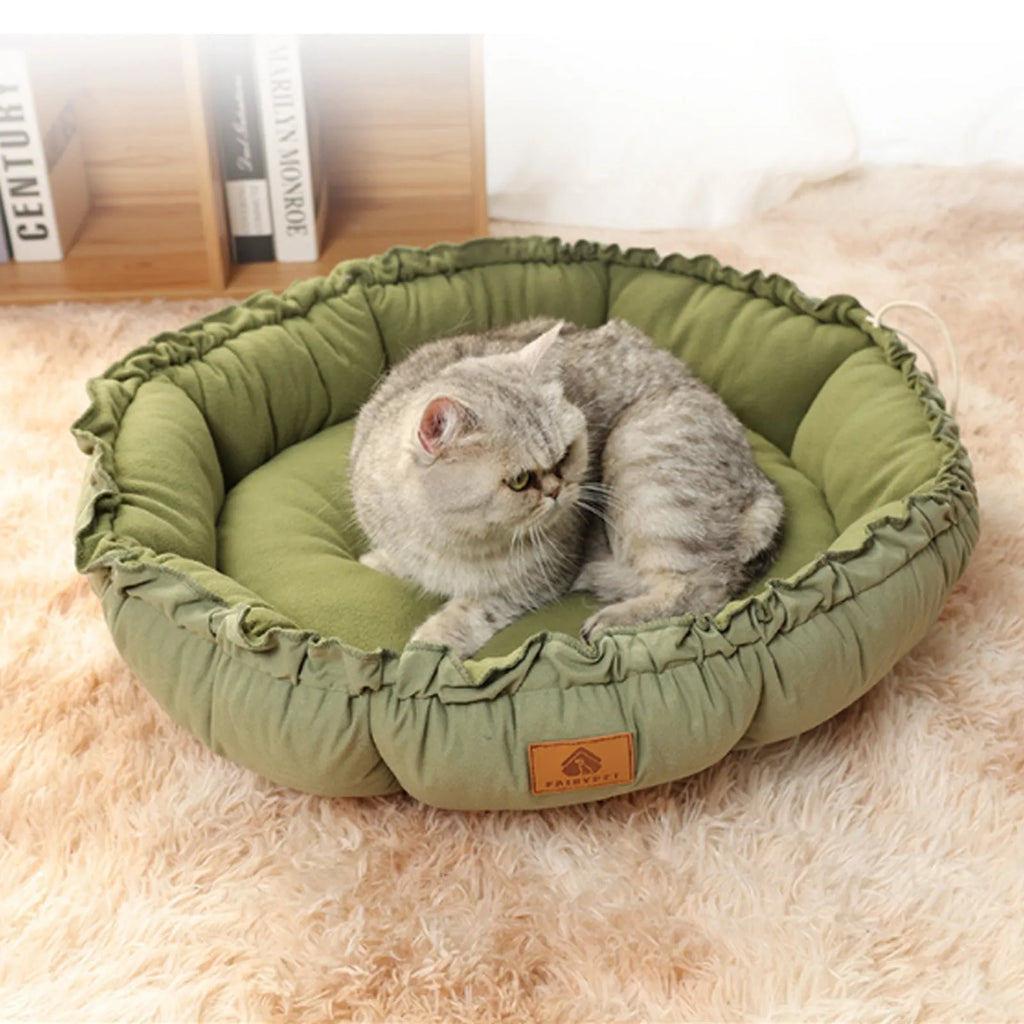 Reversible donut pet bed in grey and green colours for indoor cats and small dogs