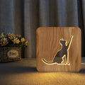 Solid wood 3D cat silhouette night light with hollow design and USB power cable