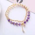 Handcrafted women's double ring crystal bracelet in amethyst, aquamarine, or strawberry quartz colour.