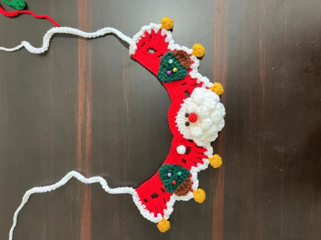 Christmas knitted wool pet scarf with festive patterns attached to dog collar