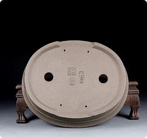 Handmade antique oval bonsai pot in purple sand clay measuring 25cm by 21cm