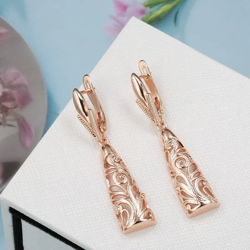 Copper retro hollow-carved leaf earrings in rose gold for women