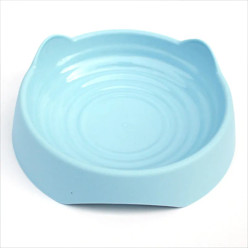 Ceramic slow feeder dog bowl with puzzle maze design in blue, green, or pink colour for fast-eating dogs