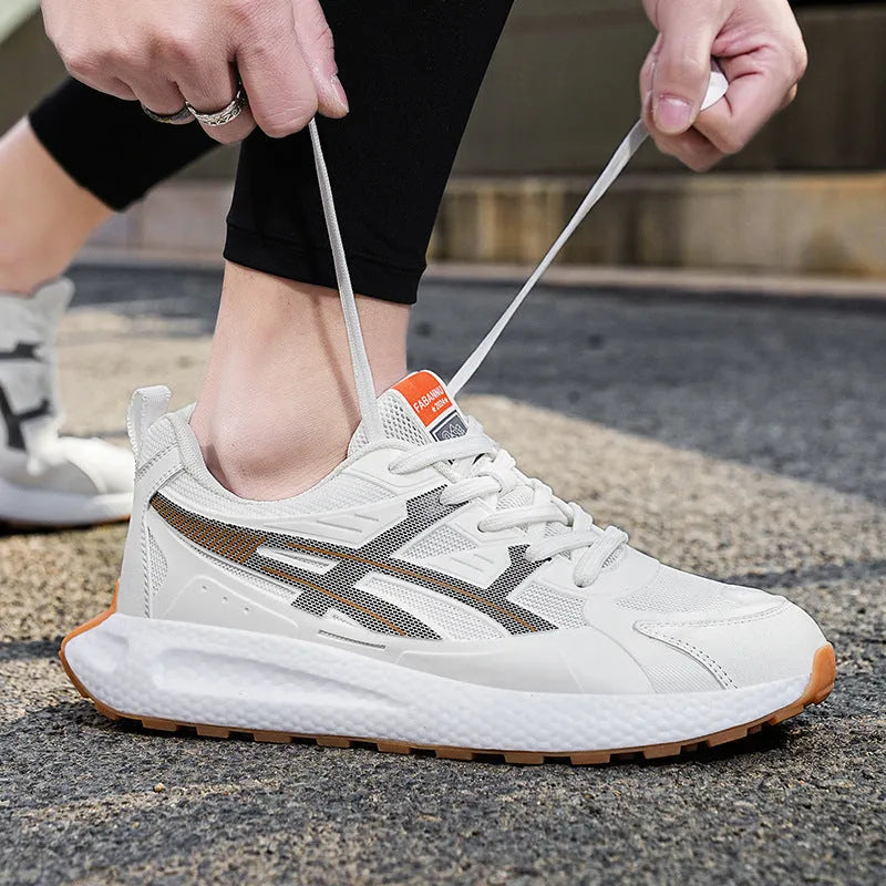 Casual non-slip popcorn shock absorption sneaker with KPU network upper in white, black, or light gray.