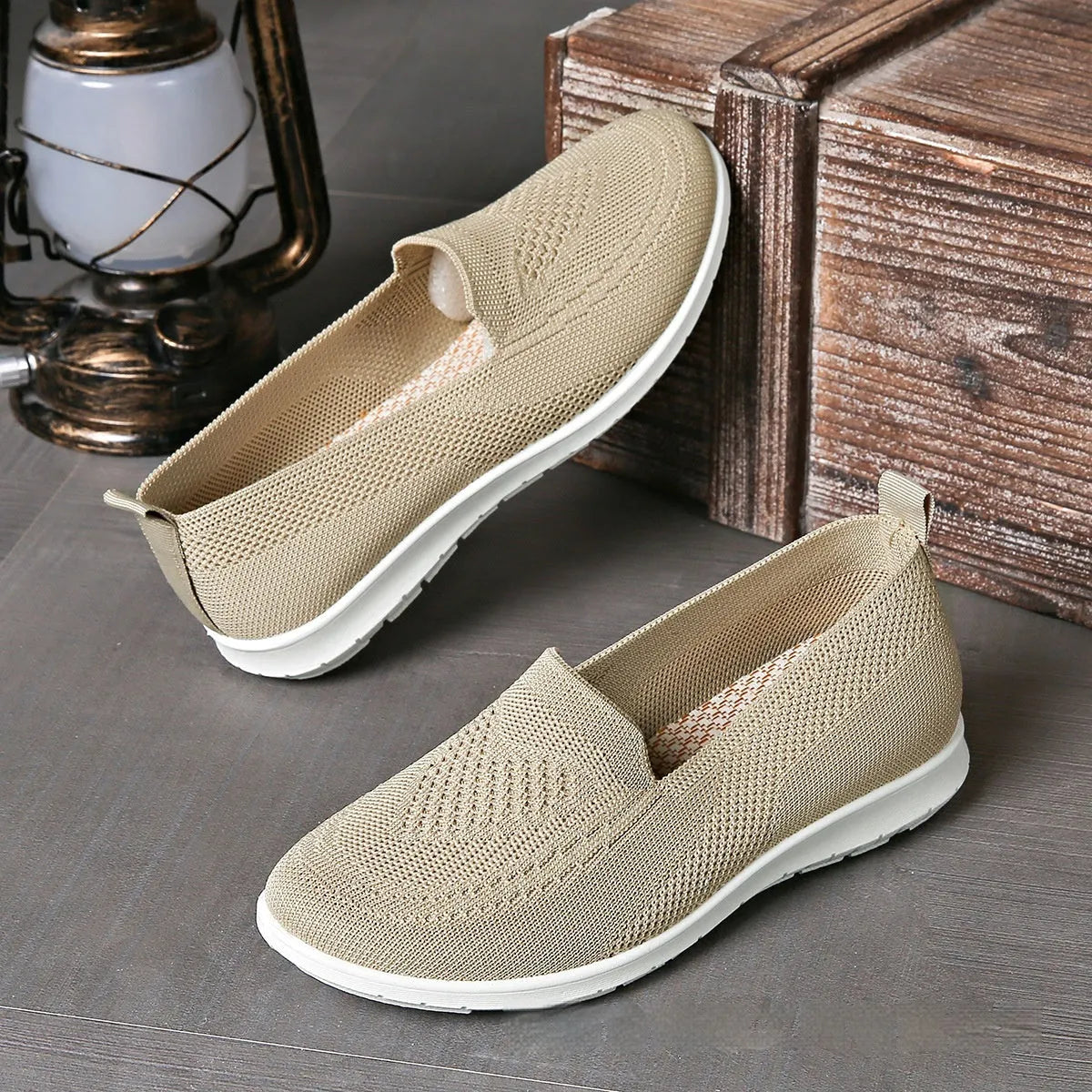 Plus size women's low-top leisure cloth shoes in beige with a heart-shaped pattern and flat sole.