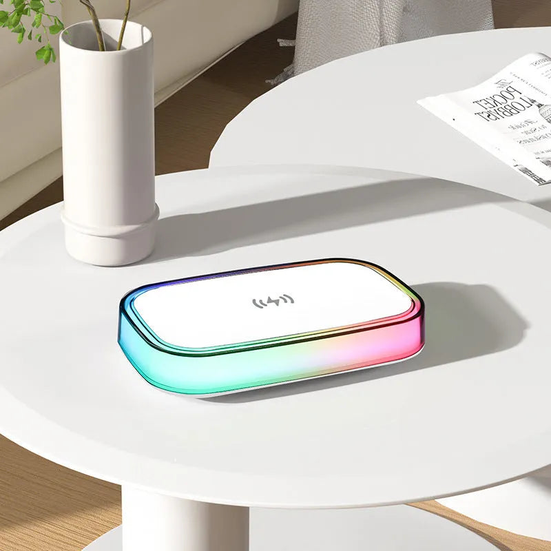 White 15W wireless fast charger with touch night lamp on a desk