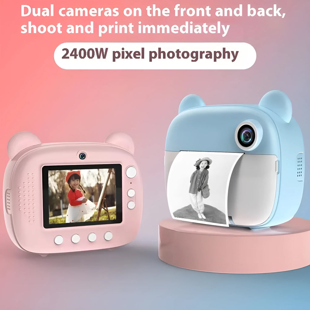 Pink children's handheld SLR toy camera with double lens on a table.