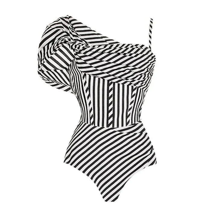Women's striped one-piece swimsuit with black ruffled skirt detail for swimming and beachwear