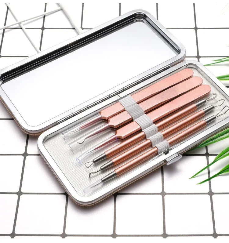 Six stainless steel acne remover tools with rose gold finish for professional pimple extraction