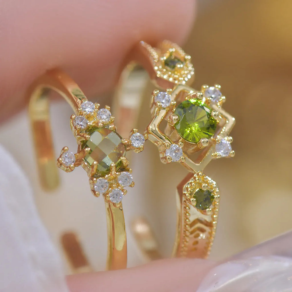 French design copper open mouth ring with purple zircon stones in geometric setting