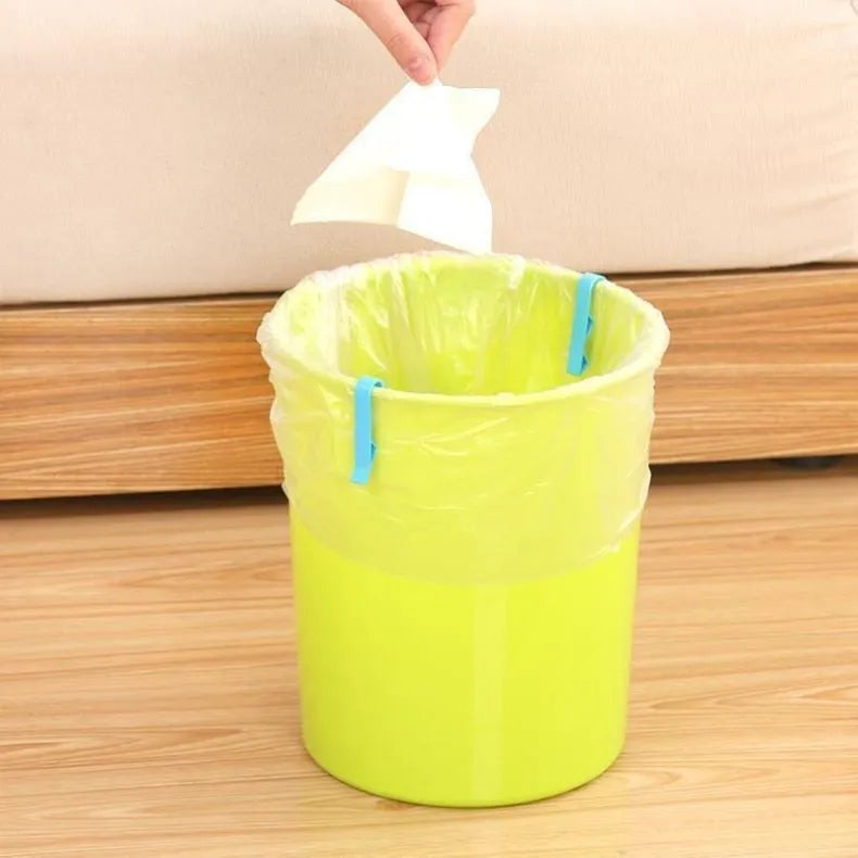 White PP plastic non-slip clip for fixing a bin liner to the side of a kitchen rubbish bin.