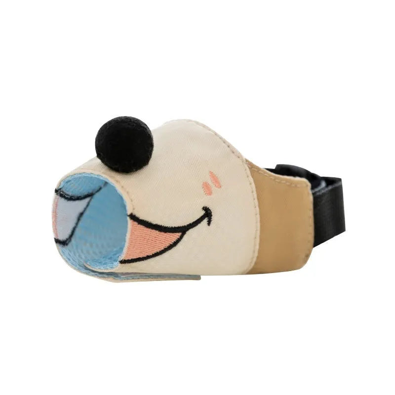 Canvas dog muzzle in Ollie Brown Bear colour on a size chart showing S, M, L, and XL options.