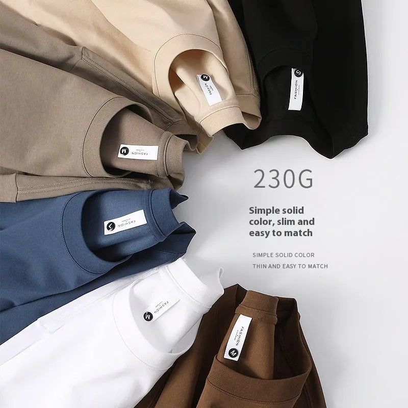 Man wearing a heavyweight apricot coloured drop shoulder loose fit t-shirt for casual wear.