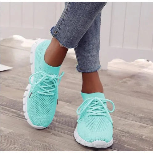Women's high-cut lace-up platform sneakers in a casual style with a breathable upper and rubber sole